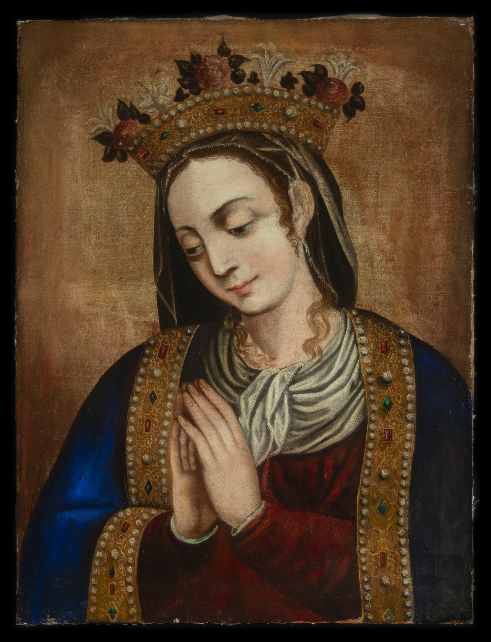 A painting of the Virgin Mary by Bernardo Bitti, showcasing her with a peaceful expression and hands clasped in prayer. She wears an ornate golden crown embellished with jewels and flowers, and her robe is richly adorned with intricate gold embroidery and gemstones. The background features a soft, warm tone that highlights the figure's spiritual presence.