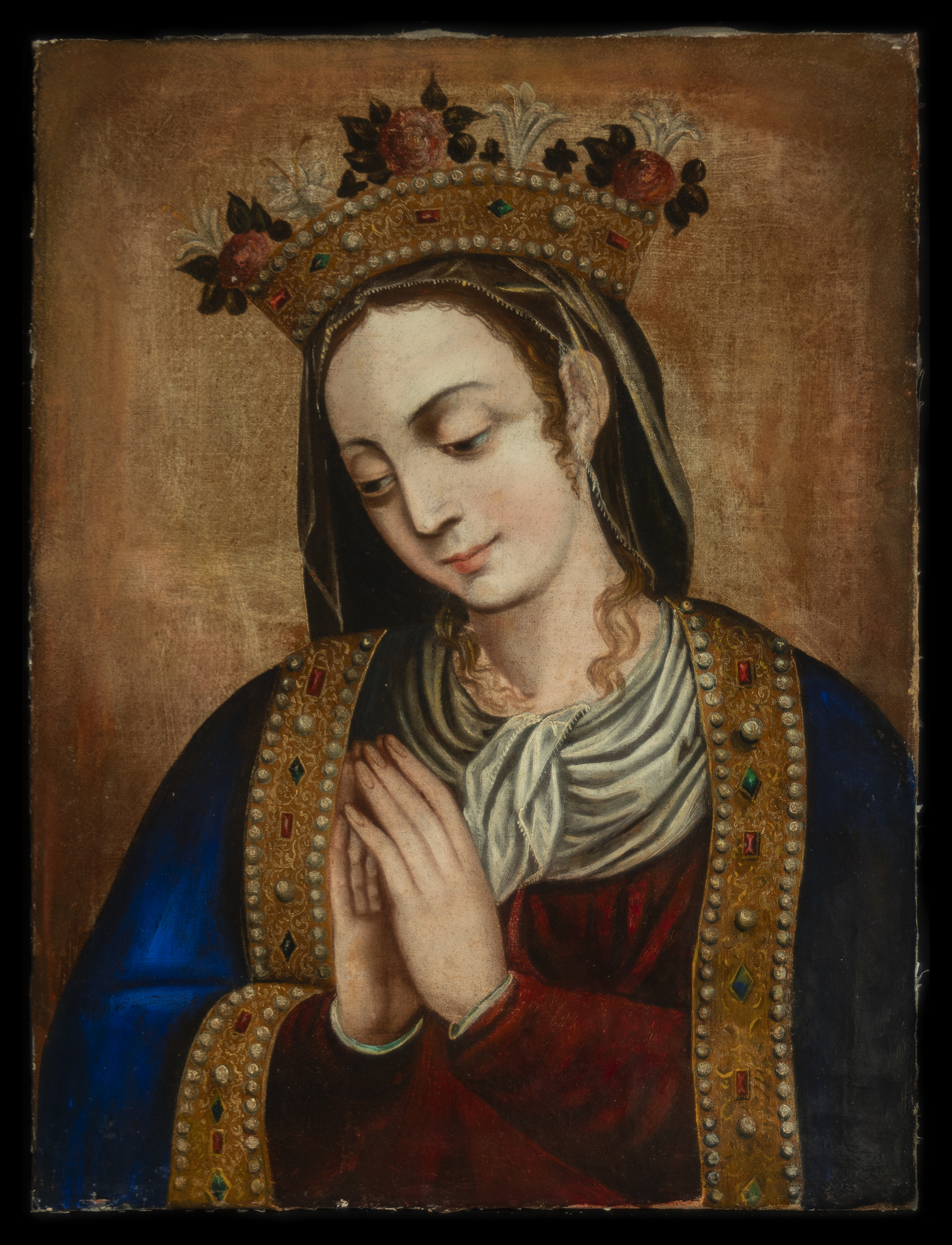 A painting of the Virgin Mary by Bernardo Bitti, showcasing her with a peaceful expression and hands clasped in prayer. She wears an ornate golden crown embellished with jewels and flowers, and her robe is richly adorned with intricate gold embroidery and gemstones. The background features a soft, warm tone that highlights the figure&#039;s spiritual presence.
