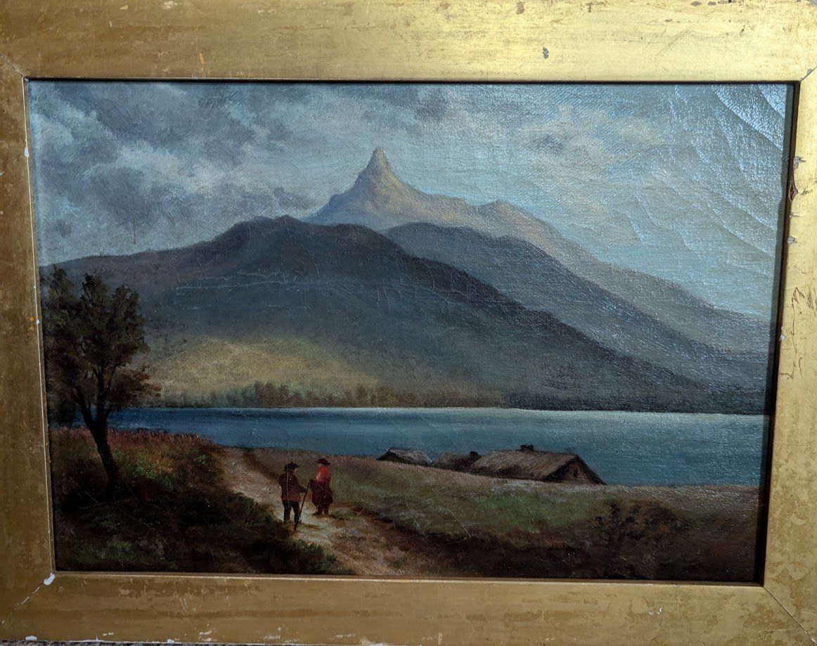 Mountainous Landscape with figures walking along a path beside a lake